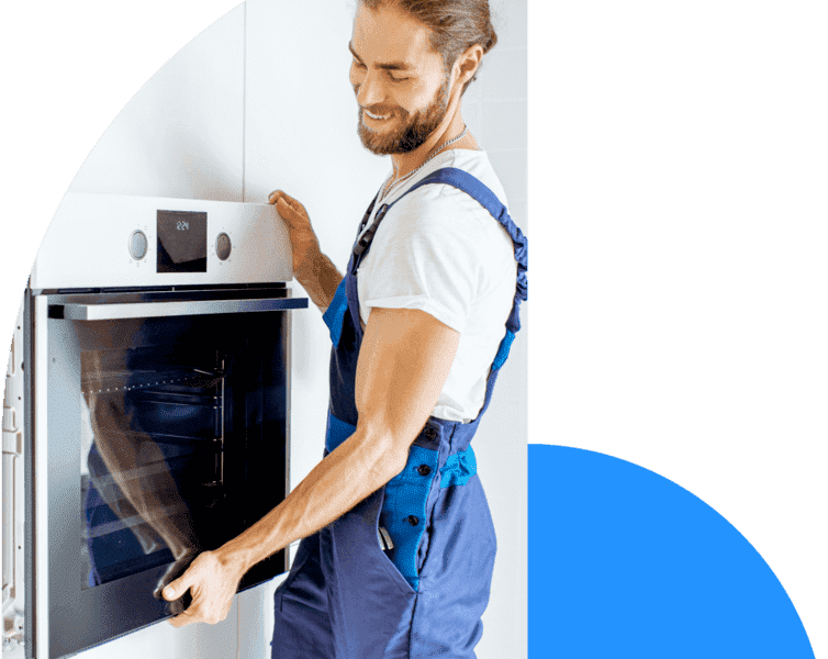oven repairman installing a new oven